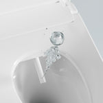 Lafeme Thea bidet toilet suite in gloss white, shown close up with water wash nozzle inside the rimless bowl