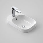 Caroma Luna white inset hand basin with single taphole and chrome mixer, rectangular ceramic design