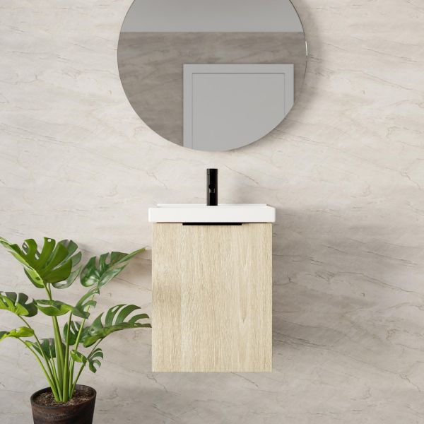 Marquis Caleta compact wall hung vanity with white top and coastal oak finish in bathroom setting