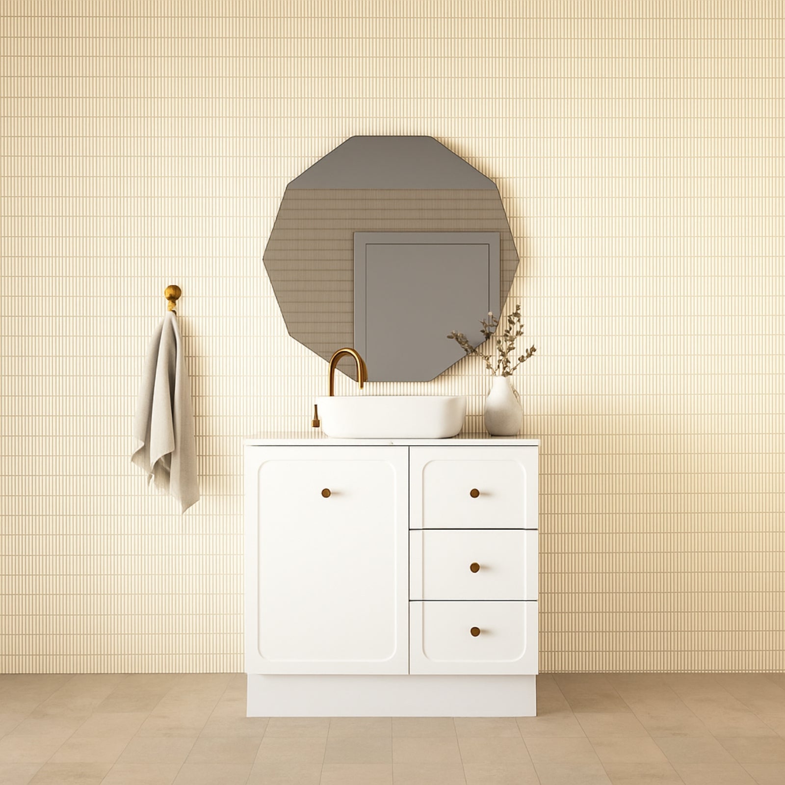 Marquis Camden white floor-standing vanity with kickboard, centre basin and brass tapware in a styled bathroom