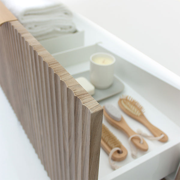 Marquis Cove wall hung vanity drawer detail in fluted timber grain finish, with white internal drawer organiser