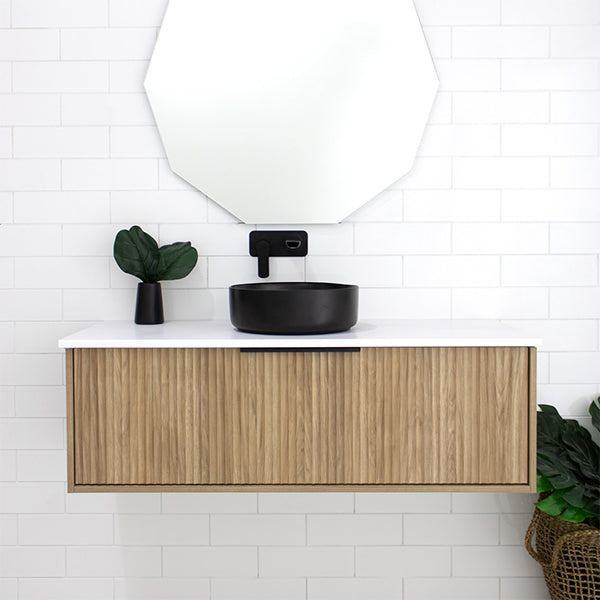 Marquis Cove wall hung vanity with fluted timber grain cabinet, white top and black round basin, front view