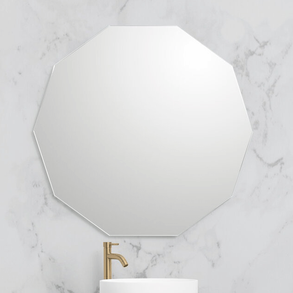 Marquis Deco round mirror with ten-sided shape, shown above a bathroom basin on a marble-look wall