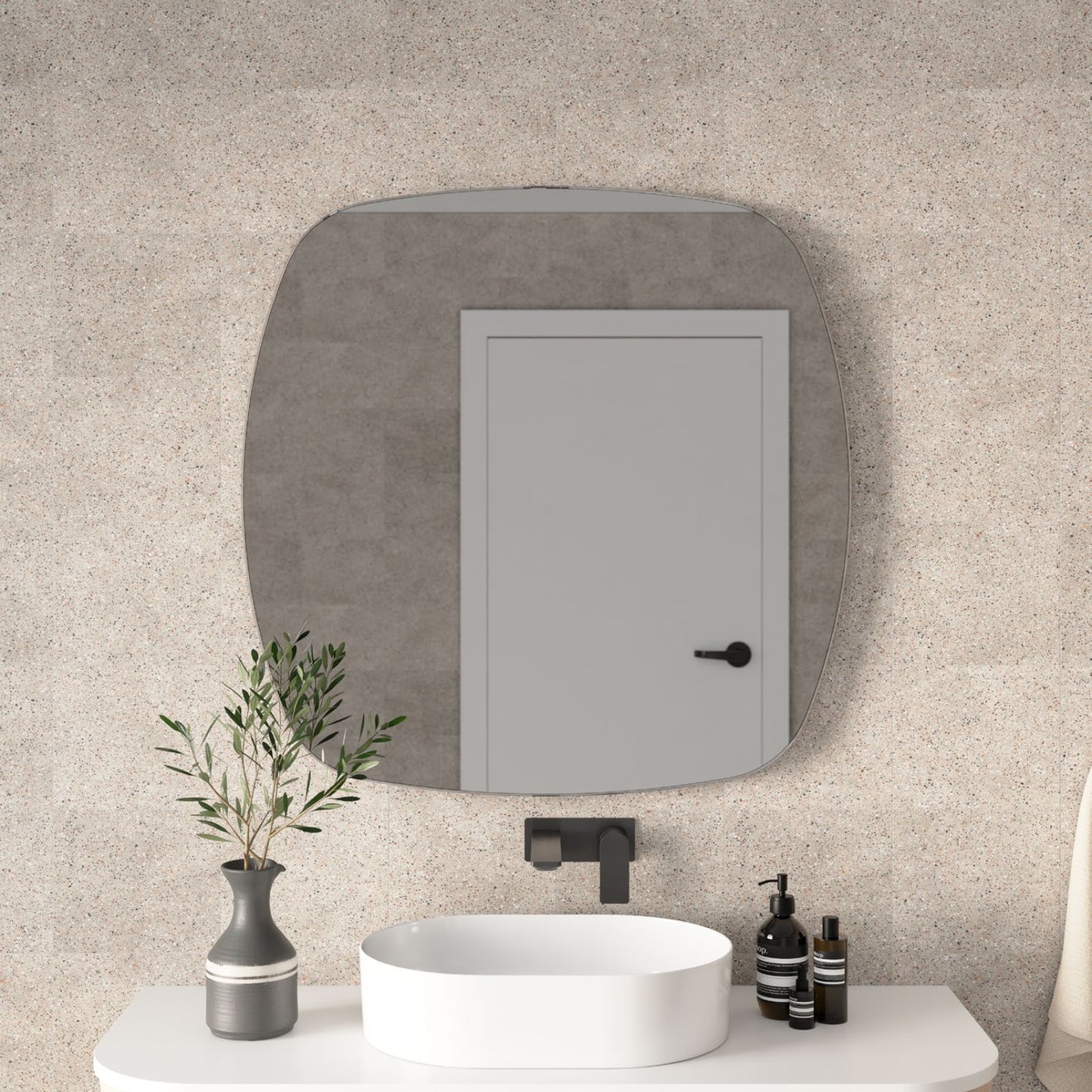 Marquis Kyka frameless rectangular mirror in grey, shown above a bathroom vanity in a styled bathroom scene
