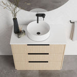 Marquis Lake floor standing vanity in coastal oak with white top and round basin, front view, black handles