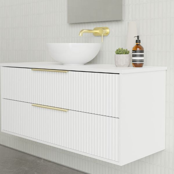 Marquis Lake wall hung vanity in white with fluted drawers, white benchtop, brass handles and round above-counter basin