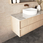 Marquis Marlo wall hung vanity with white Symphony top, woodgrain finish and white oval basin in bathroom setting