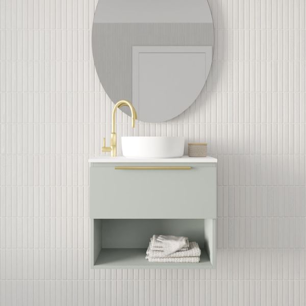 Marquis Oxford wall hung ensuite vanity in pale green with white top, brass handle and open shelf under basin on tiled wall