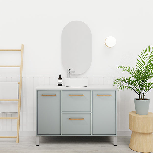 Marquis Palm floor standing vanity in pale grey with timber handles, white basin and legs in a modern bathroom setting