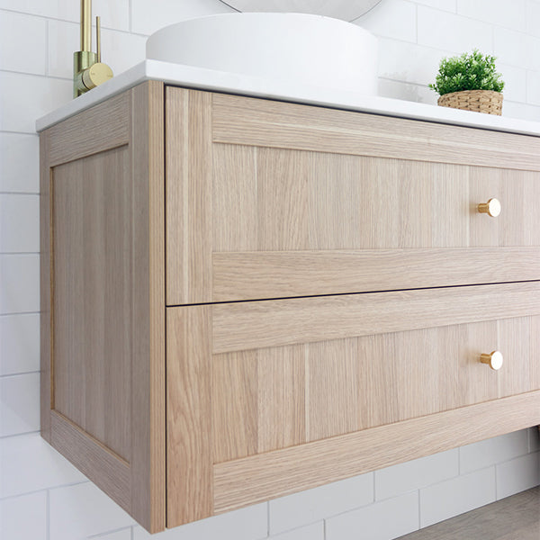 Marquis Pier wall hung vanity in natural oak finish with shaker drawers, white benchtop and brushed brass knobs