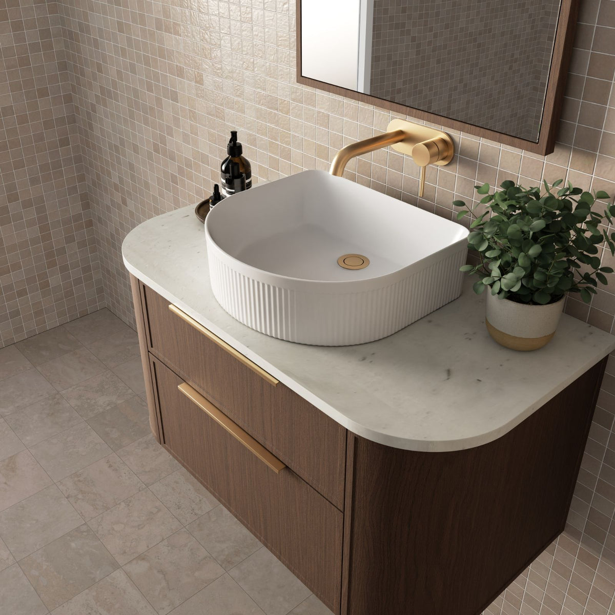 Marquis Reef wall hung vanity with Symphony top, woodgrain finish, white basin and brushed brass handles in bathroom setting