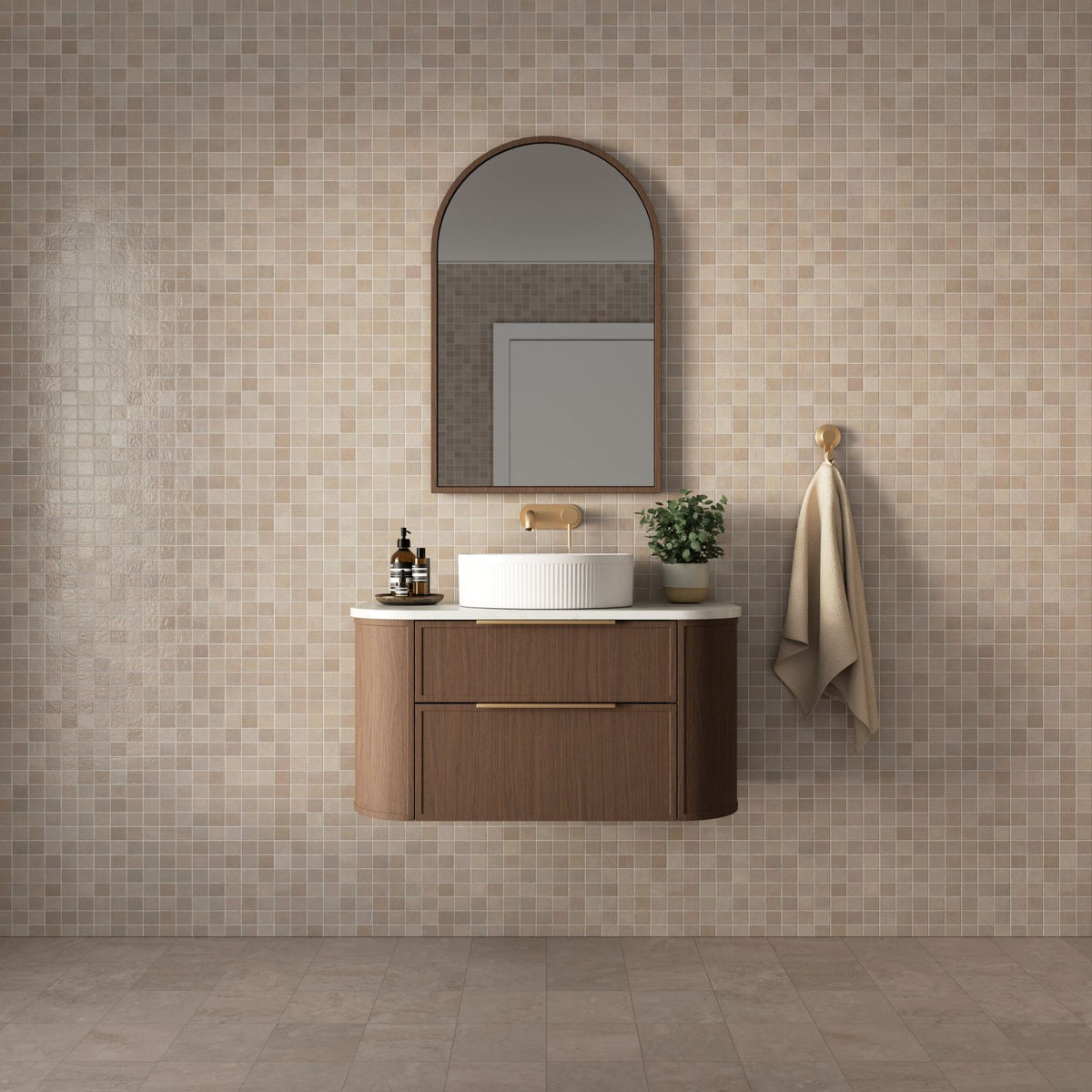 Marquis Reef wall hung vanity with white Symphony top, timber-look finish and brass handles, shown in a bathroom setting
