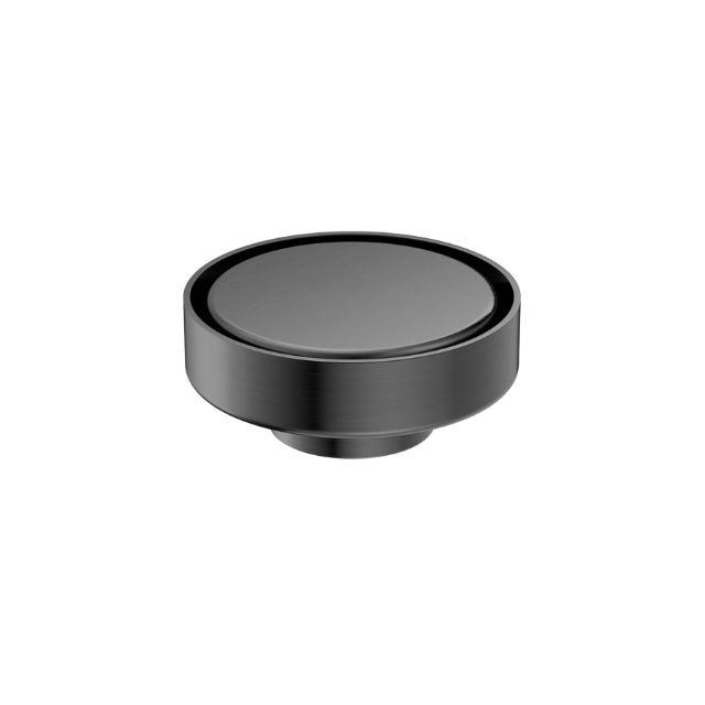 Nero 100mm round tile insert floor waste in gun metal, shown on white background
