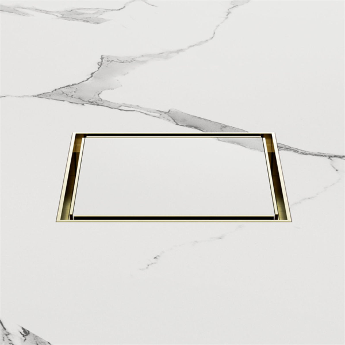 Nero square tile insert floor waste in brushed gold, shown flush set into white marble-look tiles.