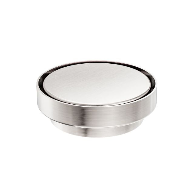 Nero round tile insert floor waste in brushed nickel, 130mm, with 100mm outlet on white background