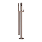 Nero Bianca floor-mounted bath mixer with hand shower in brushed bronze, freestanding tap on round base