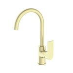 Nero Bianca gooseneck kitchen mixer tap in brushed gold, single-lever hob mounted brass sink mixer on white background