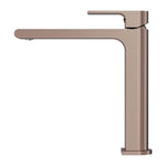 Nero Bianca mid tall basin mixer in brushed bronze, side view with tall square body and slim spout