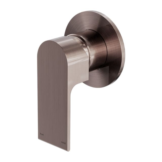 Nero Bianca shower mixer with 80mm round plate in brushed bronze, wall-mounted tap trim shown angled on white background