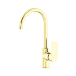 Nero Ecco kitchen mixer tap in brushed gold, with curved gooseneck spout and single lever handle on white background