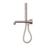 Nero Kara progressive shower system in brushed bronze, with separate plate, wall-mounted 250mm spout and hand shower hose