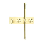 Nero Kara brushed gold wall-mounted progressive shower system with 250mm spout and handheld shower on rectangular faceplate