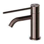 Nero Mecca Care basin mixer tap in brushed bronze, with extended lever handle and curved spout, side view