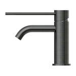 Nero Mecca Care basin mixer in gun metal, side view with sleek cylindrical body and curved spout