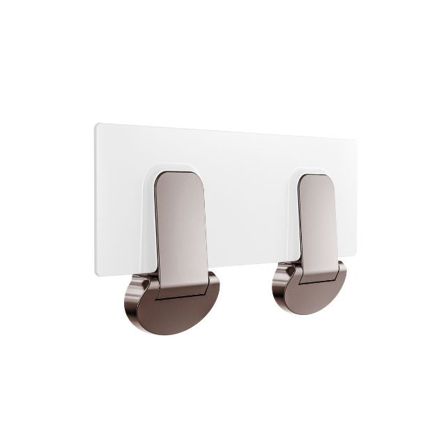 Nero Mecca Care fold-down shower seat in brushed bronze, shown folded flat against the wall