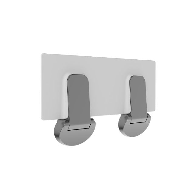 Nero Mecca Care fold-down shower seat in gunmetal, shown folded flat against the wall on a white background