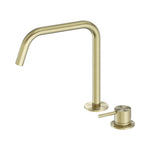 Nero Mecca brushed gold hob mixer set with swivel gooseneck spout and separate lever handle on white background
