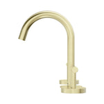 Nero Mecca brushed gold basin set with curved arc spout and lever handle, shown on white background