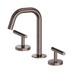 Nero Mecca 3-piece basin tap set in brushed bronze, with edge spout and lever handles on a white background