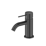 Nero Mecca Mini Basin Mixer in gun metal, compact round matte basin tap with curved spout on white background