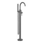 Nero Mecca round freestanding mixer tap with hand shower in gunmetal, floor-mounted beside bath