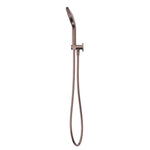 Nero Mecca hand shower on bracket with hose, brushed bronze wall-mounted finish on white background