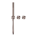Nero Opal progressive shower system in brushed bronze, wall-mounted with separate round plates and handheld rail showerhead