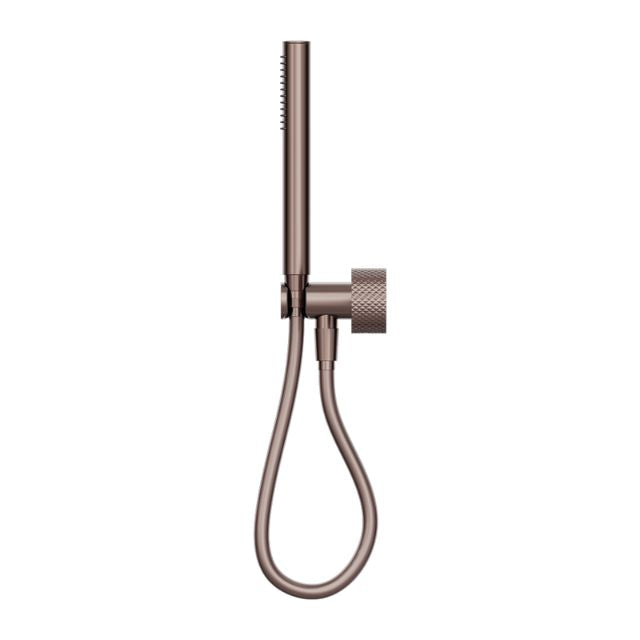 Nero Opal progressive shower system in brushed bronze with separate plate and handheld hose, wall-mounted on white background