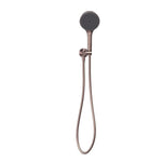 Nero Opal hand shower on bracket with hose in brushed bronze, wall mounted on white background