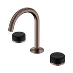 Nero Serenity basin set with arc spout, brushed bronze finish and black marble handles on white background