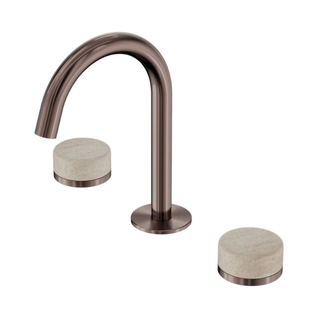 Nero Serenity basin set with brushed bronze arc spout and two travertine handles on white background