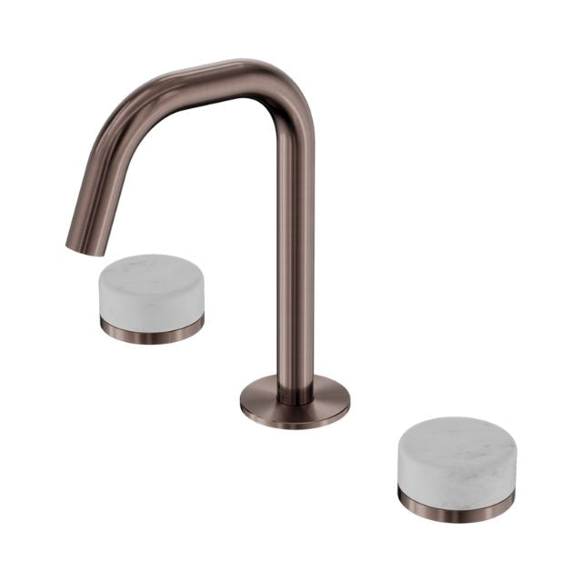 Nero Serenity basin set with edge spout in brushed bronze and white Carrara marble handles, isolated on white