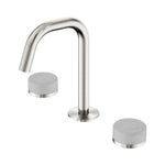 Nero Serenity basin set in brushed nickel with edge spout and Carrara marble handles, shown on white background