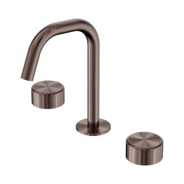 Nero Serenity brushed bronze 3-piece basin tap set with edge spout and two metal handles on white background