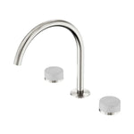 Nero Serenity 3-piece tap set in brushed nickel with arc spout and round Carrara marble handles, front view on white background