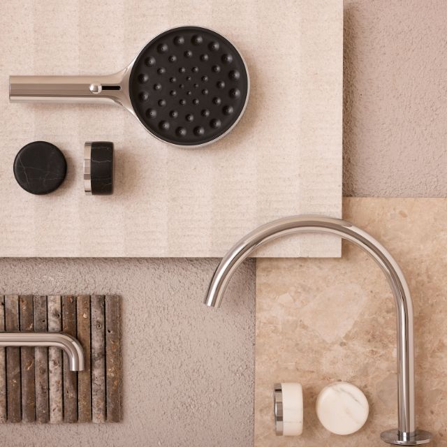 Nero Serenity brushed nickel arc spout and Carrara handle tap set with black and white finish samples
