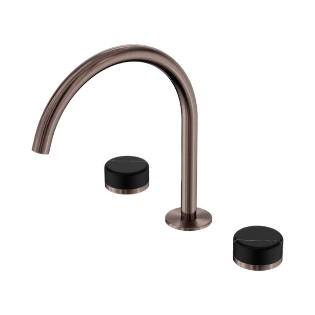 Nero Serenity 3-piece tap set with arc spout, brushed bronze finish and black handles on white background