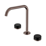 Nero Serenity wall-mounted bath/kitchen tap set in brushed bronze with Marquina black handles, shown on white background