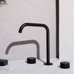 Nero Serenity matte black bath/kitchen set with edge spout and marble black handles on white stone surface