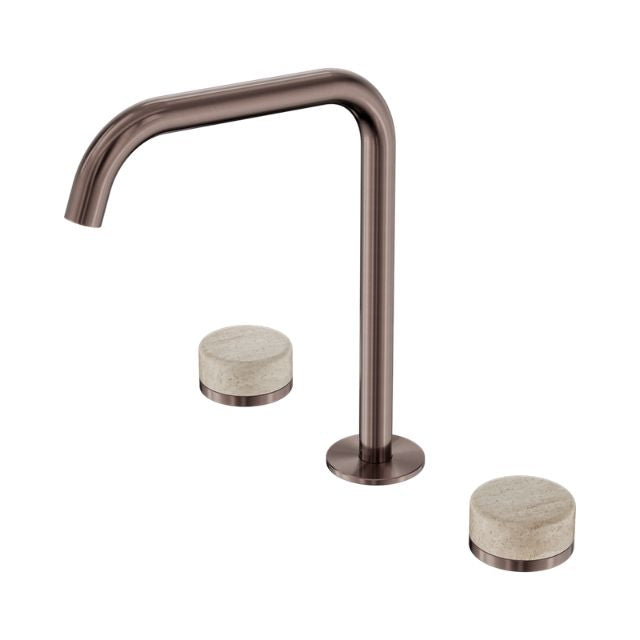 Nero Serenity brushed bronze kitchen sink set with curved edge spout and travertine handles on white background